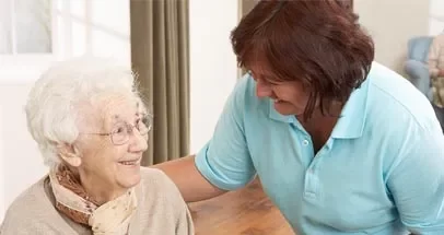 Care Worker With Elderly Lady